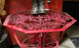 Water jet cut steel table with candy apple red powder coat