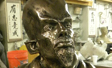 Movie prop bust cast in resin coated with bronze and black patina
